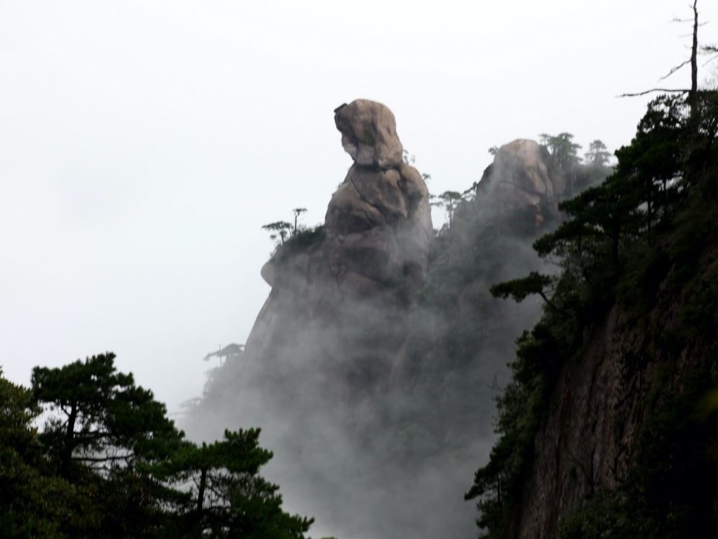 Light clouds float around the Goddess Peak